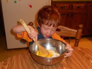 Boy makes cottage cheese pancakes